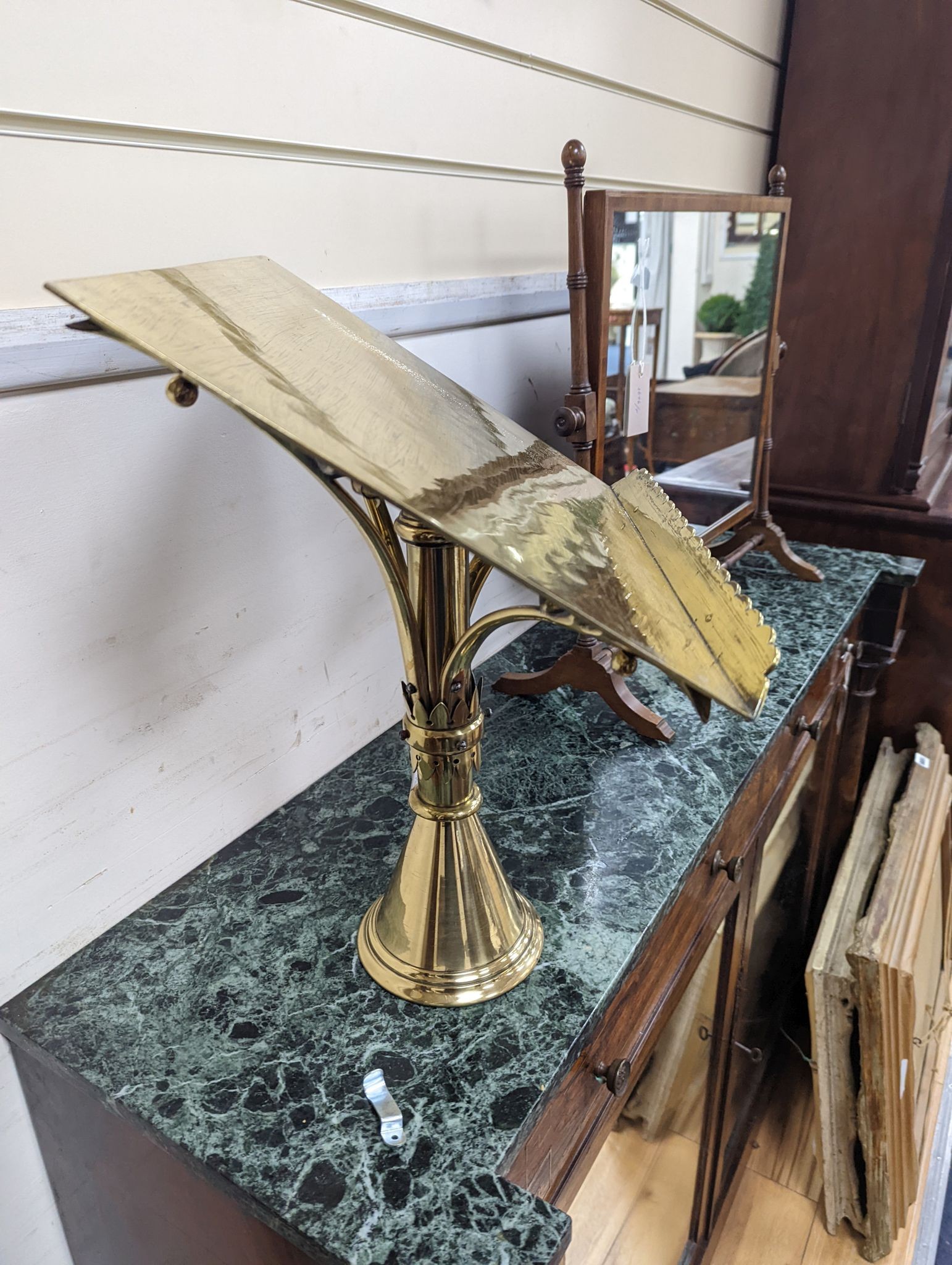 A 19th century brass ecclesiastical lectern in the manner of William Butterfield, width 38cm, depth 32cm, height 46cm